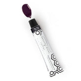 Imagen de un frasco de tinte clásico para cejas y pestañas sobre un fondo blanco.